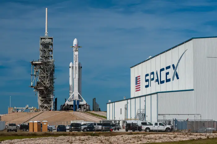 SpaceX places its 33-engine launcher on its launch pad